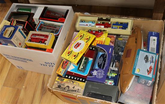 Three boxes of mixed Matchbox, Corgi and other buses, lorries, etc.